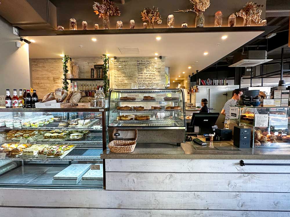 glass cabinet filled with food in a cafe