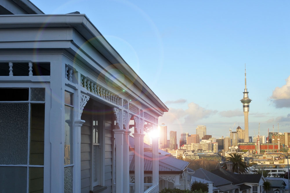 Auckland CBD skyline seen from the front porch of a victorian style home in the suburb of Ponsonby in Auckland.